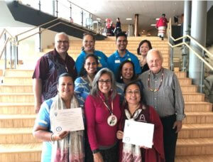 Photo: Group picture holding certificates